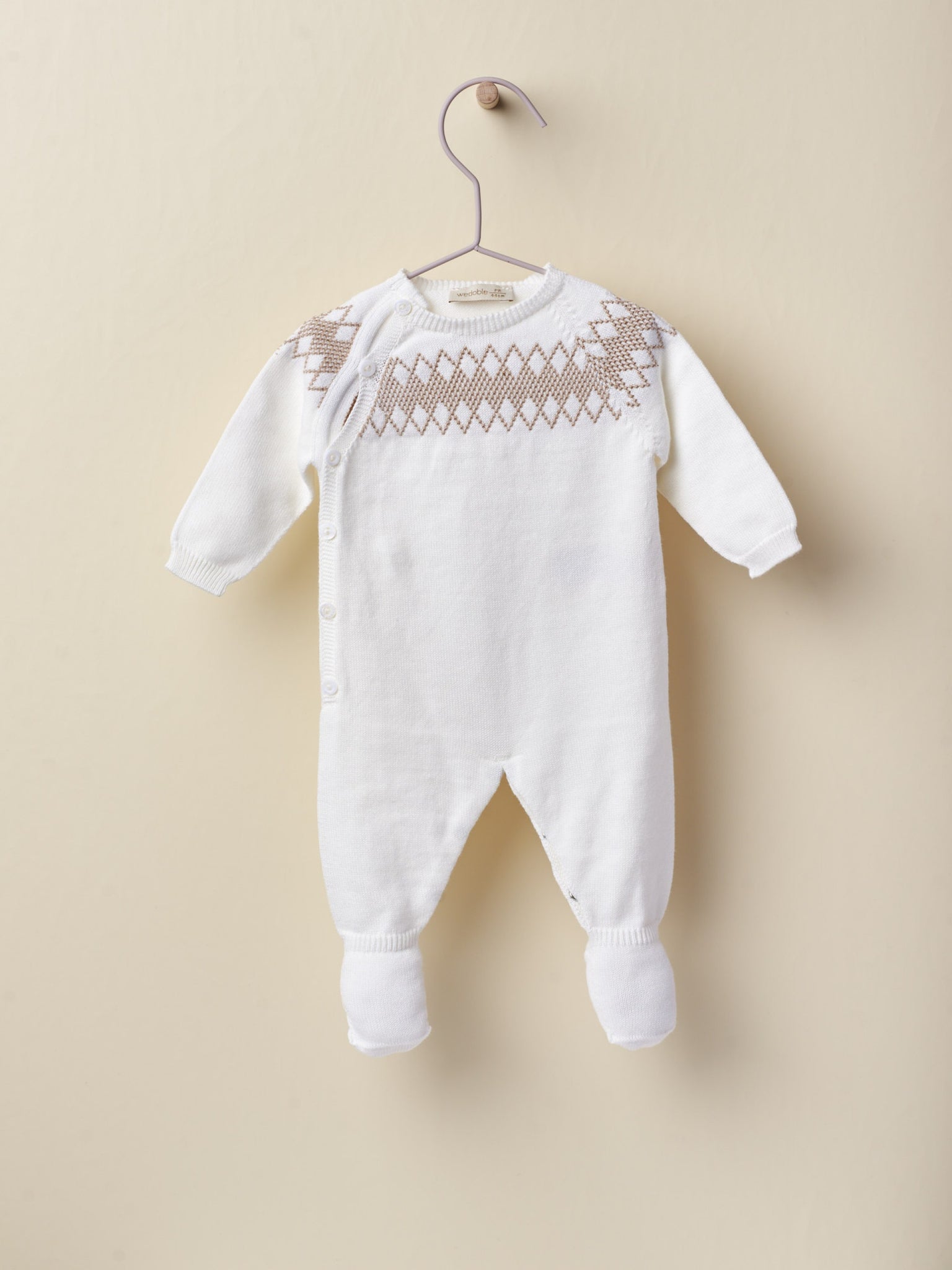 Babygrow tricotado em algodão orgânico